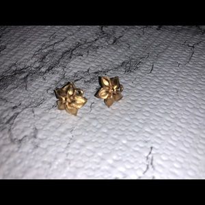 Small copper flower earrings.